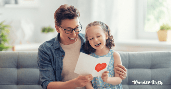 Photo of Dad and child on Father's Day doing math activities - Wonder Math