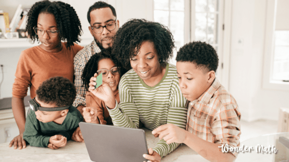 Family looking at an online learning platform like Outschool Classes or Wonder Math